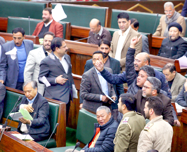 Congress MLAs staging walk-out in the Assembly on Tuesday. -Excelsior/Rakesh Congress MLAs staging walk-out in the Assembly on Tuesday. -Excelsior/Rakesh