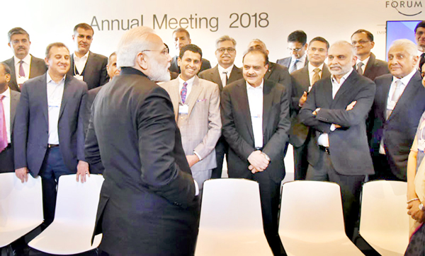 Prime Minister Narendra Modi interacting with Indian CEOs in Davos on Tuesday (UNI) Prime Minister Narendra Modi interacting with Indian CEOs in Davos on Tuesday (UNI)