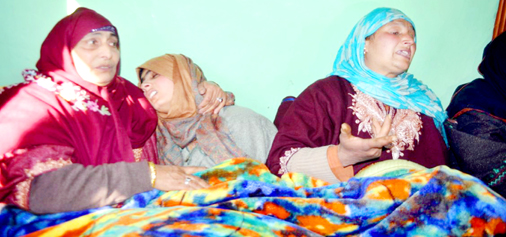 Family of PhD scholar, who joined Hizb in mourning, urging him to return, at their Lolab house in Kupwara on Monday. -Excelsior/Aabid Nabi