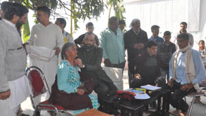 HoD Cardiology Dr Sushil Sharma examining patients at Mathwar on Sunday. HoD Cardiology Dr Sushil Sharma examining patients at Mathwar on Sunday.