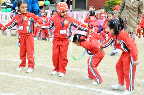 Children performing an activity while celebrating Sports Day at GLS Public School in Jammu on Wednesday. Children performing an activity while celebrating Sports Day at GLS Public School in Jammu on Wednesday.