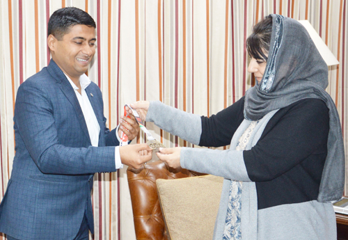 Chief Minister Mehbooba Mufti honouring Gaurav Gupta in Jammu on Friday. Chief Minister Mehbooba Mufti honouring Gaurav Gupta in Jammu on Friday.