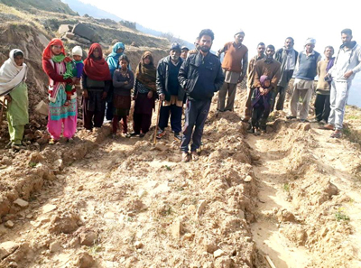 Villagers showing incomplete stretch of road from Tandhar to Pakhlai in Chenani. Villagers showing incomplete stretch of road from Tandhar to Pakhlai in Chenani.