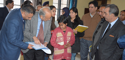 Justice Ali Mohammad Magray interacting with inmate of Children's Home at R S Pura on Wednesday. Justice Ali Mohammad Magray interacting with inmate of Children's Home at R S Pura on Wednesday.