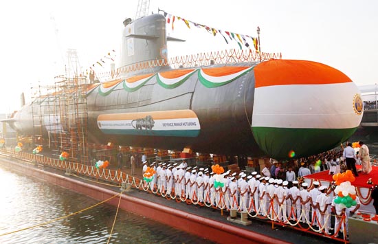 A priest performs rituals before the launch of India's third Scorpene-class submarine INS Karanj at the Mazagon Dock Ltd. naval ship building yard, in Mumbai, India. A priest performs rituals before the launch of India's third Scorpene-class submarine INS Karanj at the Mazagon Dock Ltd. naval ship building yard, in Mumbai, India.
