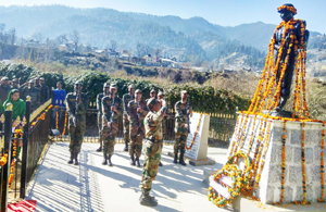 Officers and jawans paying respect to highly decorated soldier at his Smriti Sathal in Doda on Army Day. Officers and jawans paying respect to highly decorated soldier at his Smriti Sathal in Doda on Army Day.