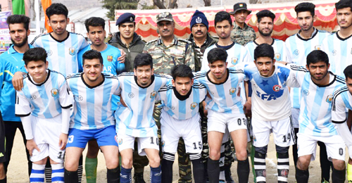 Winners of Football Tournament posing along with dignitaries in Baramulla. Winners of Football Tournament posing along with dignitaries in Baramulla.