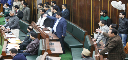 BJP MLAs protesting against NC Legislator Mohammad Akbar Lone in the Assembly on Monday. -Excelsior/Rakesh BJP MLAs protesting against NC Legislator Mohammad Akbar Lone in the Assembly on Monday. -Excelsior/Rakesh