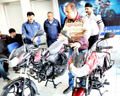 Dignitaries during launch of Discover 110 and 125 models at NSF-Bajaj, Satwari, Jammu on Friday. Dignitaries during launch of Discover 110 and 125 models at NSF-Bajaj, Satwari, Jammu on Friday.