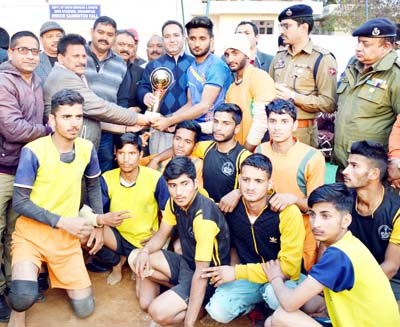 Winners of Kabaddi tournament posing for a group photograph along with MoS Sports, Sunil Kumar Sharma on Saturday. Winners of Kabaddi tournament posing for a group photograph along with MoS Sports, Sunil Kumar Sharma on Saturday.