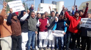 NPP activists staging protest outside DyCM’s residence in Jammu on Tuesday. NPP activists staging protest outside DyCM’s residence in Jammu on Tuesday.