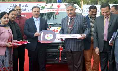 Chairman J&K Bank handing over keys of ambulance to Vice Chancellor of CUJ. Chairman J&K Bank handing over keys of ambulance to Vice Chancellor of CUJ.