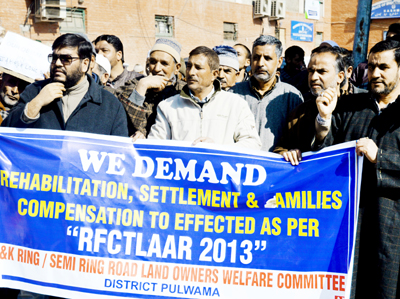 Land owners protesting in support of their demand on Saturday. -Excelsior/ Shakeel Land owners protesting in support of their demand on Saturday. -Excelsior/ Shakeel