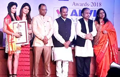 Jammu based model, Ashima Sharma, receiving award at Golden Star Awards 2018 in Jaipur. Jammu based model, Ashima Sharma, receiving award at Golden Star Awards 2018 in Jaipur.