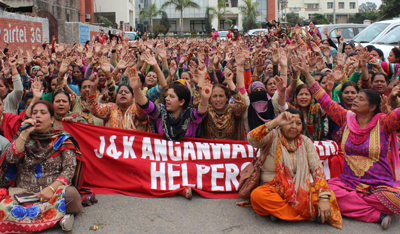 Anganwari workers and helpers during a protest in front of the office of Divisional Commissioner, Jammu. —Excelsior/Rakesh Anganwari workers and helpers during a protest in front of the office of Divisional Commissioner, Jammu. —Excelsior/Rakesh