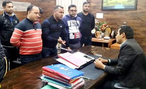 ReT teachers apprising DDC Udhampur about pending MDM bills. ReT teachers apprising DDC Udhampur about pending MDM bills.