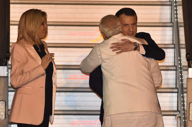 French Prez arrives for four-day visit; PM Modi receives him at airport
