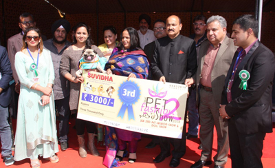 Chairperson PWWA, Bharti Vaid distributing prizes during Dog & Pet Fashion Show at Gulshan Ground in Jammu. Chairperson PWWA, Bharti Vaid distributing prizes during Dog & Pet Fashion Show at Gulshan Ground in Jammu.