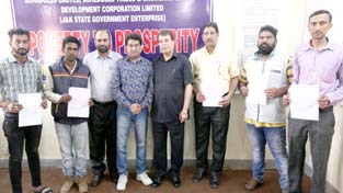 VC, SC, ST, BC Corporation, Balbir Ram Rattan posing with unemployed youth after handing over PALs to them at Jammu on Wednesday. VC, SC, ST, BC Corporation, Balbir Ram Rattan posing with unemployed youth after handing over PALs to them at Jammu on Wednesday.