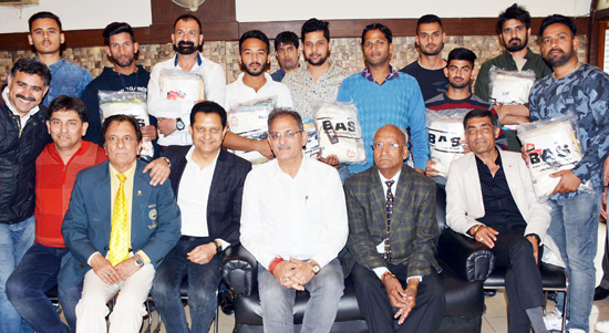 National Cricket Club players and officials posing along with Kavinder Gupta, Speaker J&K Legislative Assembly in Jammu on Friday. National Cricket Club players and officials posing along with Kavinder Gupta, Speaker J&K Legislative Assembly in Jammu on Friday.