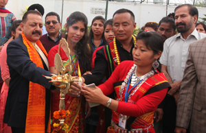Union Minister, Dr Jitendra Singh lighting a lamp at North East Youth Exchange Programme at Jammu on Sunday. — Excelsior/Rakesh Union Minister, Dr Jitendra Singh lighting a lamp at North East Youth Exchange Programme at Jammu on Sunday. — Excelsior/Rakesh