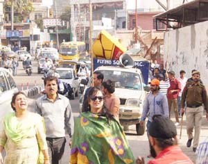 JMC officials during an anti encroachment drive in Jammu on Thursday. JMC officials during an anti encroachment drive in Jammu on Thursday.