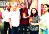 Poet and Journalist, Ayushman Jamwal along with other guests during the launch of his poetry collection 'Silent Sun' at New Delhi.