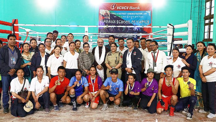 Winners of School Olympics posing along with Chief Secretary J&K, BVR Subramanyam and other dignitaries in Leh.