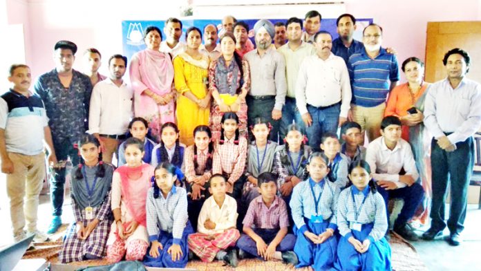 Winners of On The Spot Children Music Competition posing along with dignitaries in Jammu.