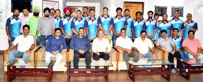 JU’s Employees Cricket Reasi posing alongwith Prof Manoj Dhar in Jammu. JU’s Employees Cricket Reasi posing alongwith Prof Manoj Dhar in Jammu.