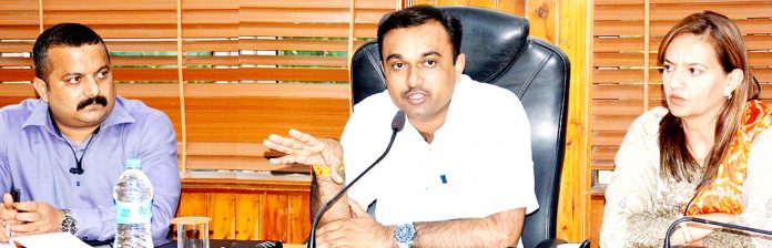 DC Ramesh Kumar chairing a meeting in Jammu on Monday.