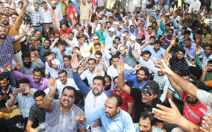 ReT teachers raising slogans during a sit in protest at Jammu on Tuesday. -Excelsior/ Rakesh