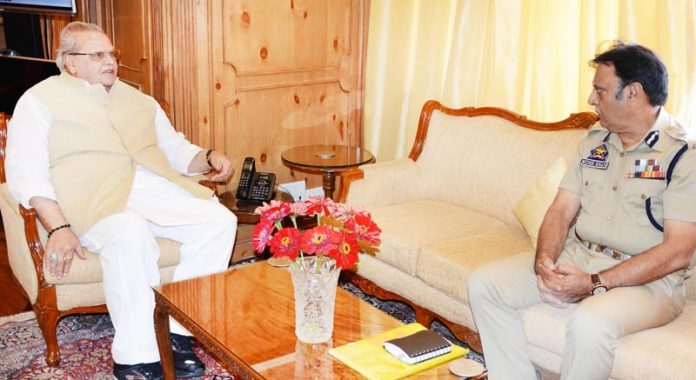 ADGP Security Muneer Khan briefing Governor S P Malik on Friday.