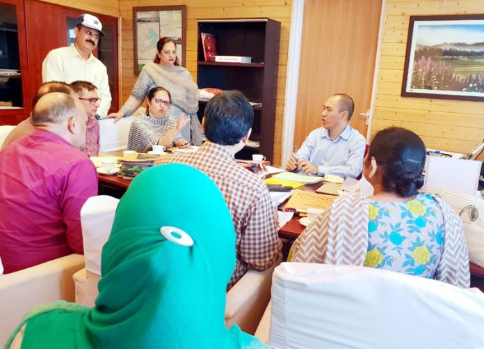 Secretary School Education Rigzin Samphel chairing a meeting in Srinagar on Wednesday.