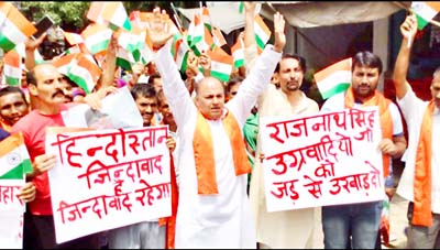 Dogra Front and Shiv Sena activists during a protest at Jammu on Thursday. Dogra Front and Shiv Sena activists during a protest at Jammu on Thursday.
