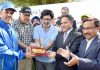 Advisor Khurshid Ganai and former CM and MP Dr Farooq Abdullah during a concluding function of Golf Tournament in Srinagar.