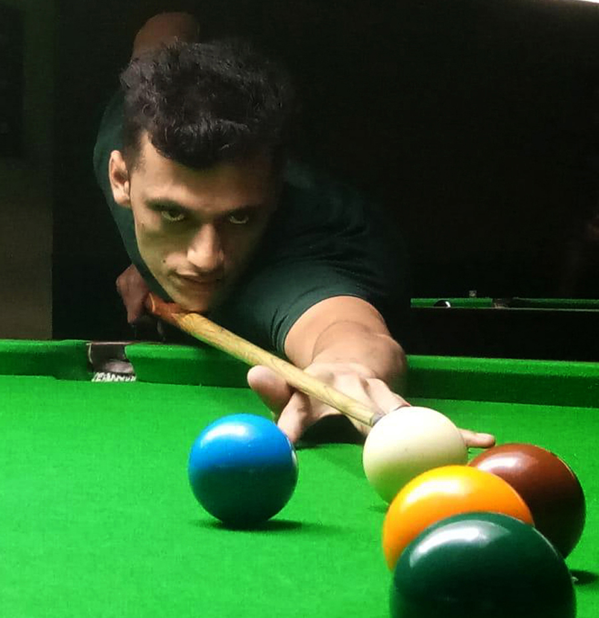 Cueist aiming at target during Six Red Balls Tournament at Billiards hall, M.A. Stadium in Jammu. —Excelsior/Rakesh Cueist aiming at target during Six Red Balls Tournament at Billiards hall, M.A. Stadium in Jammu. —Excelsior/Rakesh