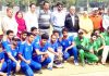 Players of the opening match of deaf and dumb cricket tournament posing along with the chief guest and other dignitaries in Srinagar.