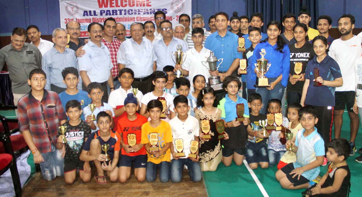 Winners of 23rd Jammu District Badminton Championship posing along with chief guest and other dignitaries at Police Lines Badminton Hall in Jammu. Winners of 23rd Jammu District Badminton Championship posing along with chief guest and other dignitaries at Police Lines Badminton Hall in Jammu.