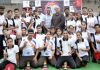 Speedball players showing victory signs during selection trials in Jammu.