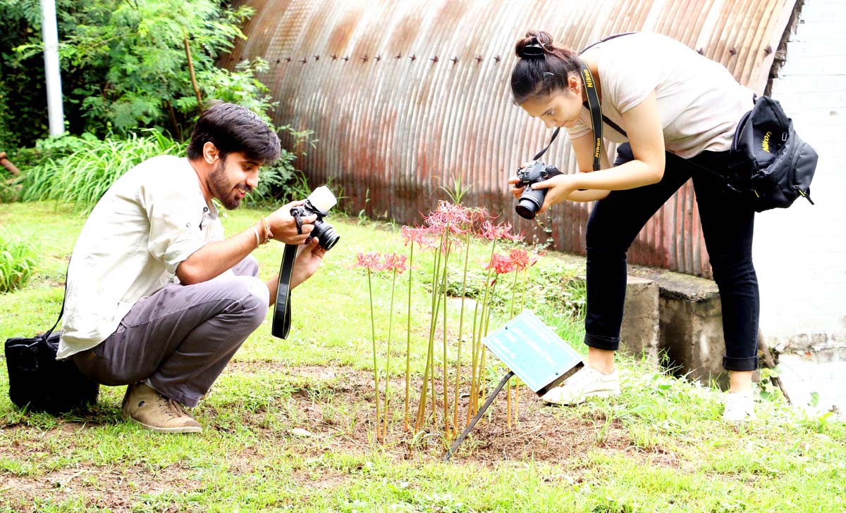 Students taking photographs during Display Your Talent competition at University of Jammu. Students taking photographs during Display Your Talent competition at University of Jammu.