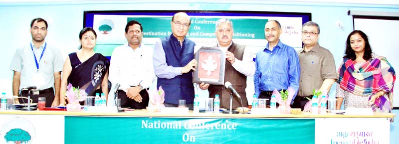 G Parthasarthy being presented memento by CUJ VC during concluding ceremony of a conference on Saturday. G Parthasarthy being presented memento by CUJ VC during concluding ceremony of a conference on Saturday.