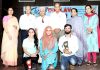 Winners of JU’s Display Your Talent holding trophies while posing for a photograph along with dignitaries.