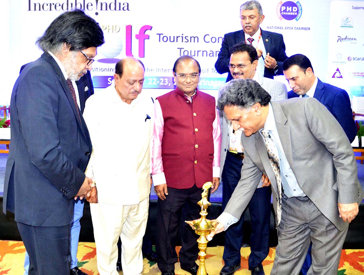 Advisor Khurshid Ganai lighting ceremonial lamp while inaugurating Golf Tournament in Srinagar. Advisor Khurshid Ganai lighting ceremonial lamp while inaugurating Golf Tournament in Srinagar.