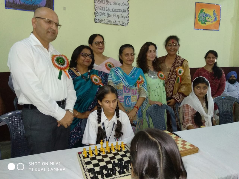 Winners of Inter-School Chess Championship posing along with dignitaries and officials. Winners of Inter-School Chess Championship posing along with dignitaries and officials.