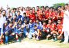 Young footballers posing along with former Minister Surjeet Singh Slathia during inaugural ceremony of Football Tournament at Vijaypur in Samba.