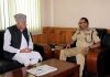 NC chief, Farooq Abdullah interacting with DGP, Dilbag Singh at Srinagar on Saturday.
