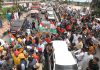 Former Minister Ch Lal Singh leading massive rally at Tawi bridge in Jammu on Sunday. — Excelsior/Rakesh
