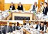 Justice Ali Mohammad Magrey chairing a meeting in Srinagar on Monday.