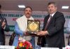 Vice Chancellor BGSBU Prof Javed Musarrat presenting memento to Parvez Ahmed, J&K Bank Chairman and CEO during interactive session.
